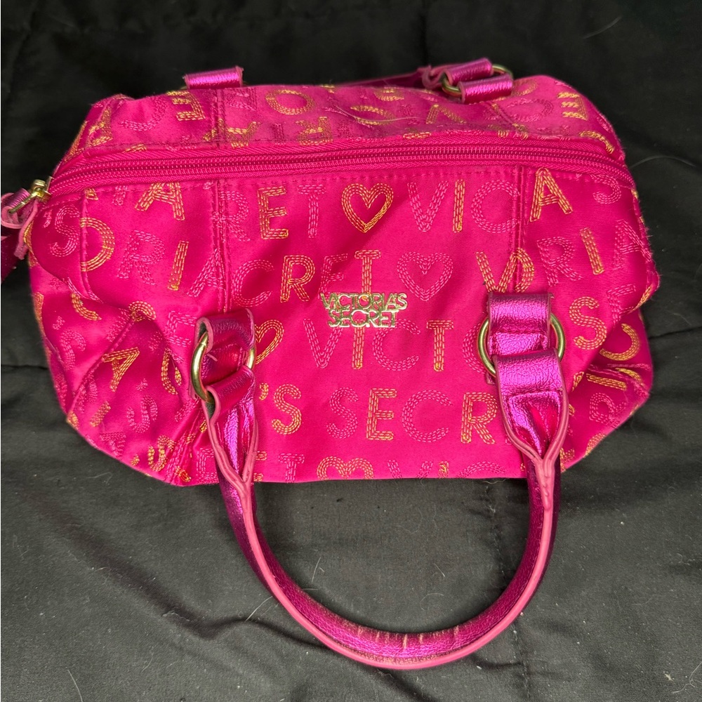 Victoria secret, huge pink makeup bag.